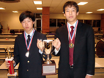 Alex Kim and Francis Deng with medals and trophies